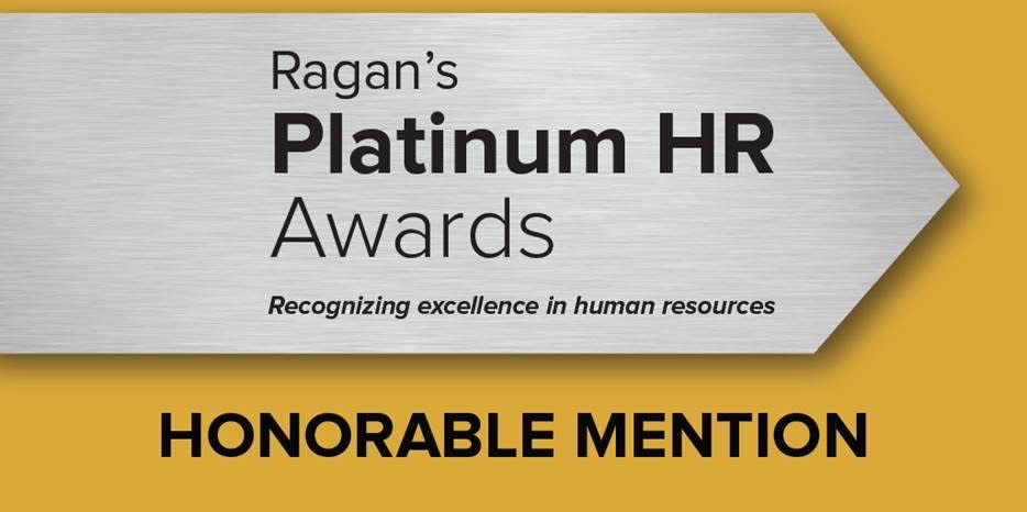 Image of a recognition plaque. The top part reads "Ragan's Platinum HR Awards" with a tagline "Recognizing excellence in human resources" below it. The bottom part features the text "Honorable Mention" in bold. The background is a metallic silver and yellow design.